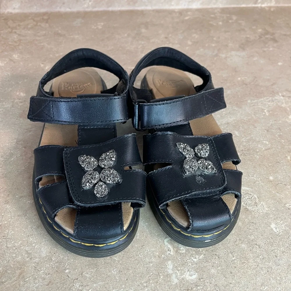 Kids Black Dr.Marten’s Glitter Flower Strap Sandals